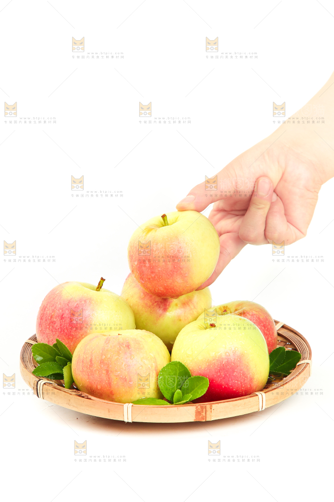 手拿嘎啦苹果
