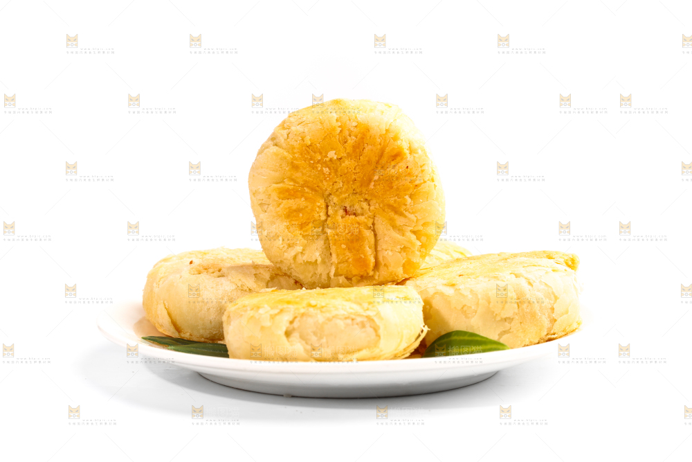 白底上放着一盘苏式馅饼月饼