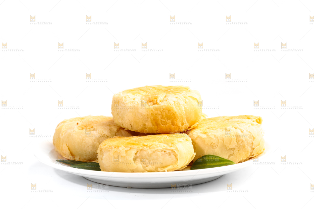 白底上放着一盘苏式馅饼月饼
