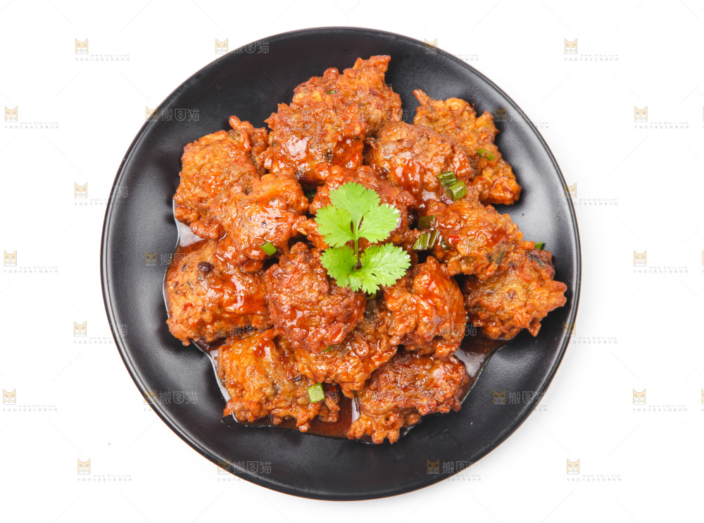 盘子里装着红烧藕圆子