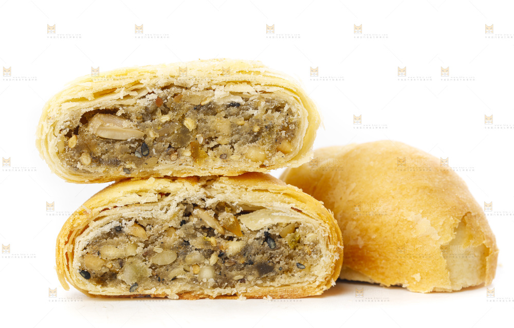 白底上摆放着一堆苏式月饼