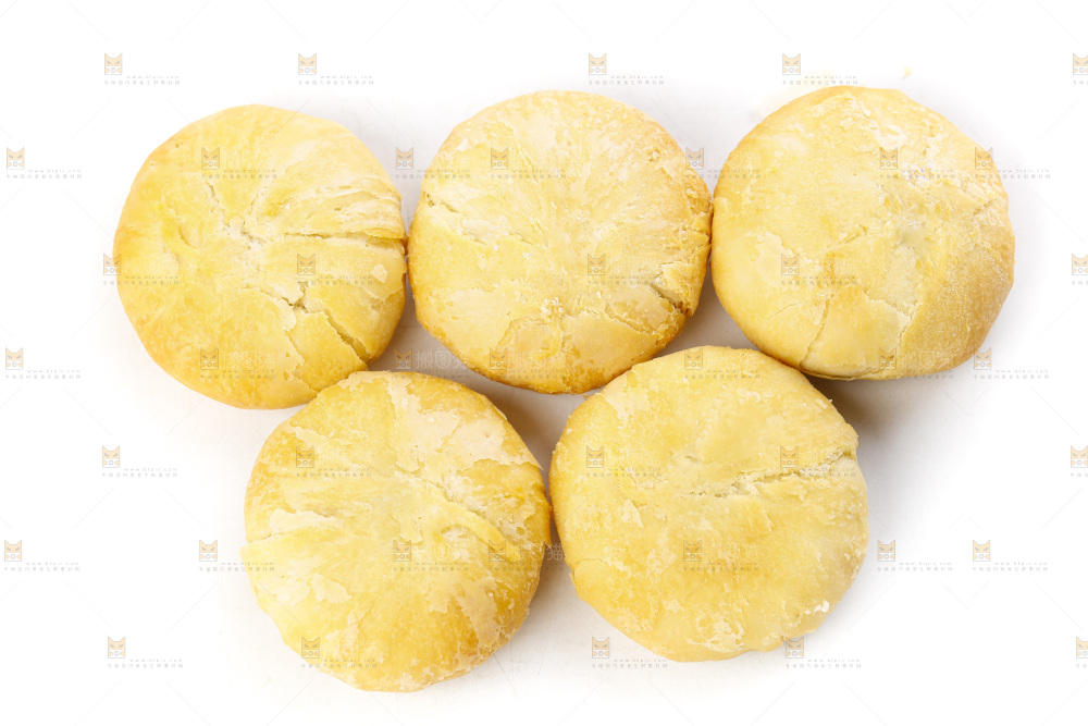 白底上摆放着一堆苏式月饼