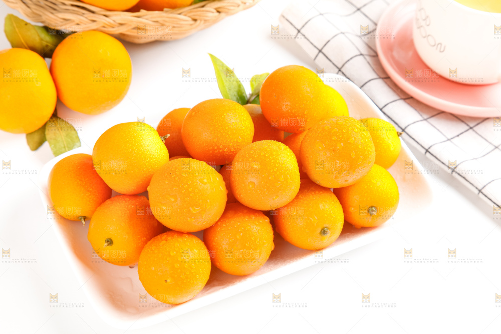 盘子里装着广西小金桔