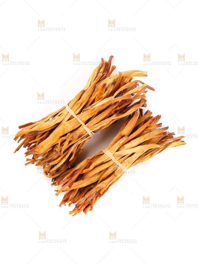 白底上摆放的干黄花
