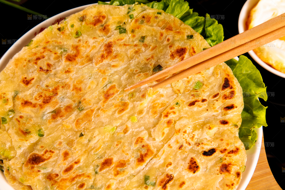 盘子里的煎手抓饼