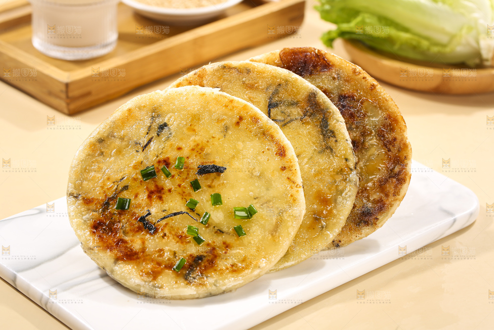 浅底上的梅干菜饼
