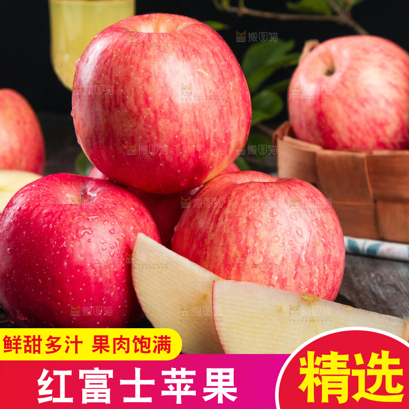 黑底上放着一堆红富士苹果