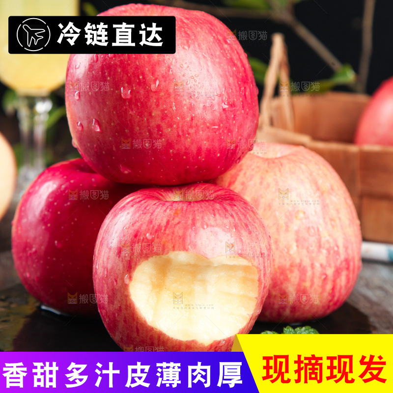 黑底上放着一堆红富士苹果