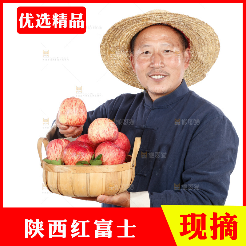 农民手里端着一篮苹果