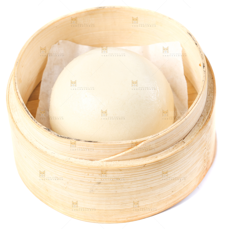 蒸笼里放着奶黄包