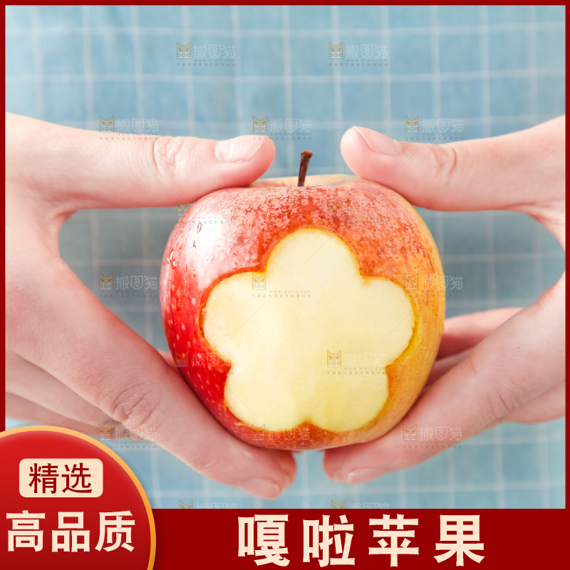 手里拿着嘎啦苹果
