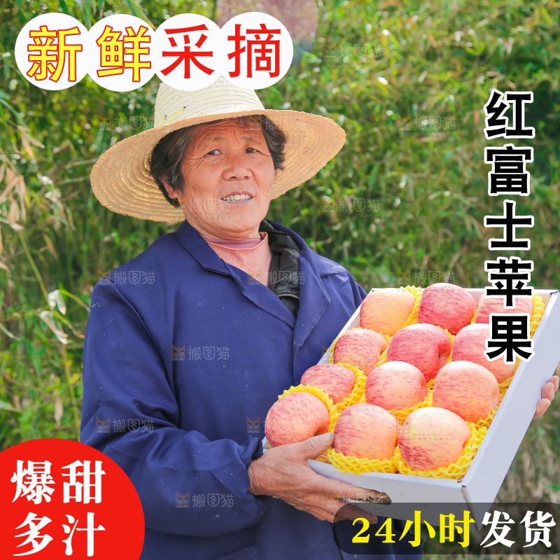 手里端着一箱条纹苹果