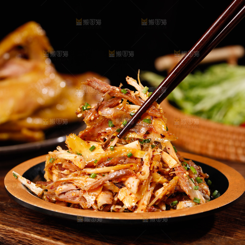 筷子上夹着菊花鸡